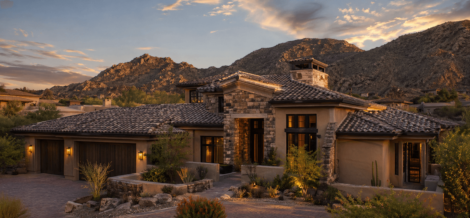 Premium completed tile roof replacement on a custom desert home at sunset in a Scottsdale-style neighborhood.